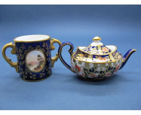 A Royal Crown Derby Miniature Teapot and Cover, of oval form, decorated with the Imari pattern, date code for 1916, 3.5cms hi