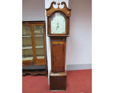 A Late XVIII Century Oak and Mahogany Longcase Clock, with swan neck pediment, brass finials and arched door, thirty hour mov