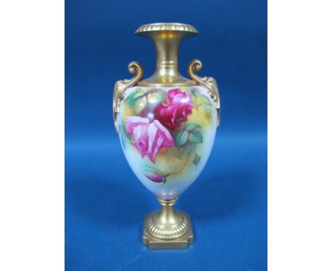 A Royal Worcester Porcelain Vase, of two handled ovoid form, with shaped neck and raised on a square pedestal foot, painted b