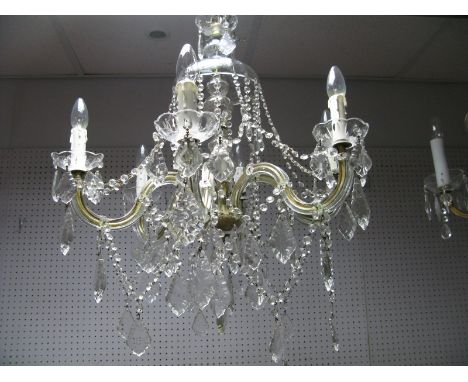 A Mid XX Century Continental Ceiling Light, having six scroll branches with octagonal lustre connectors and many pear shaped 