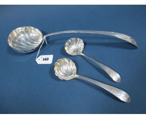 A Decorative Irish Hallmarked Silver Ladle, (makers mark unclear) Dublin 1806, with shell bowl and bright cut decoration, 150