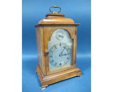 An Early XX Century German Bracket Clock, with a Winterhalder & Hofmeier movement, the white metal dial with Roman numerals, 
