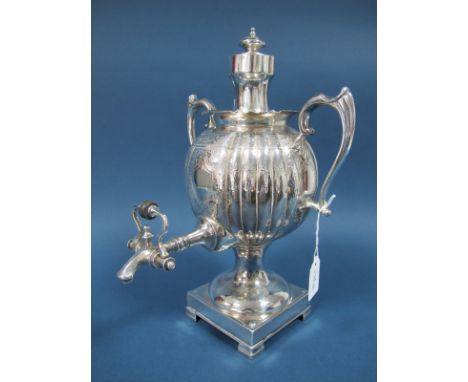 A Victorian Plated Tea Urn, of fluted ovoid form, detachable cover, engraved decoration, socle pillar, square base with brack