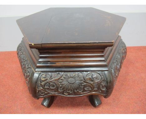 An Early XX Century Chinese Stained Softwood Squat Jardiniére Stand, of hexagonal form, having stepped upper body over pokerw