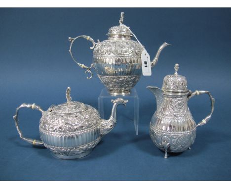 A XIX Century Dutch Teapot, allover decorated, with scroll handle, the pull off cover with winged figure finial; Together wit