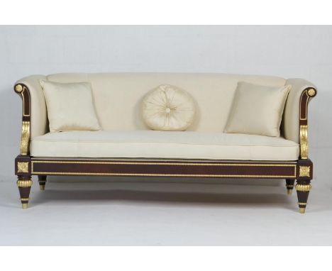 Clive Christian 'Emperor' mahogany and parcel gilt sofa, upholstered throughout in cream Clive Christian fabric, width 218cm,