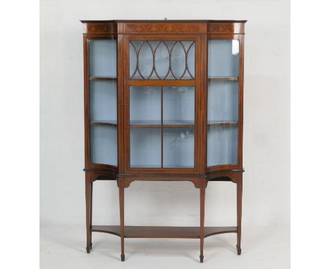 Late Victorian or Edwardian mahogany and inlaid display cabinet, circa 1895-1910, having a boxwood inlaid anthemion frieze ov