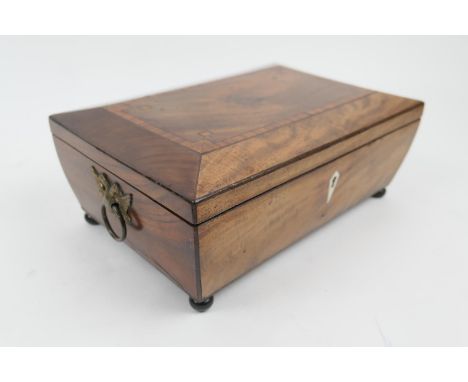Continental mahogany box, shallow sarcophagus form with ebony line inlays and brass double headed eagle and ring handles, ope