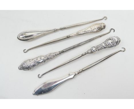 Five silver handled steel button hooks, various hallmarks (Please note condition is not noted. We strongly advise viewing to 