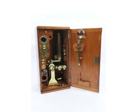 Lacquered brass monocular microscope, by J H Steward, Strand, Cornhill, London, numbered 612, circa 1880, with two objective 