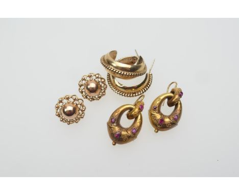 Pair of Victorian gold and ruby cannetille double loop pendant earrings, each set with four small rubies, 33mm drop, width 22