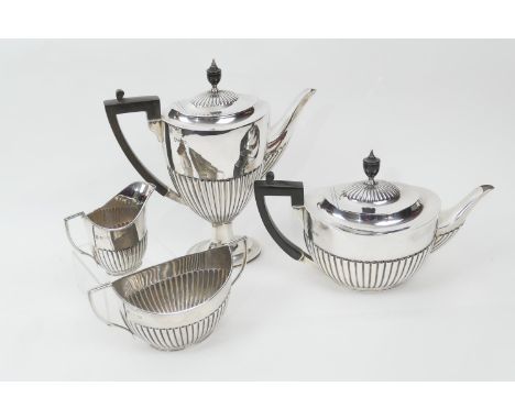 Silver composite four piece tea and coffee service, comprising teapot, sugar basin and milk jug by William Hutton &amp; Sons,