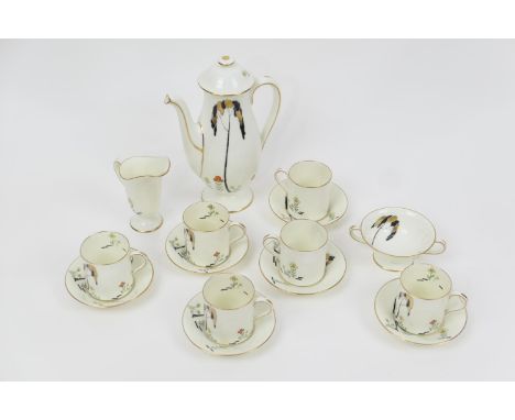 Royal Doulton china coffee service, pattern no. 1112, having a gold and black tree with stylised flowers at the base, against