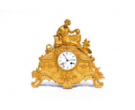 A French gilt bronze mantel clock with a personification of science, 19th C.H 31,5 - L 34 - D 11 cm  The work marked 'Medaill