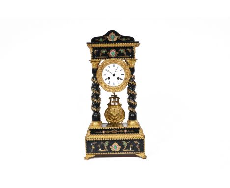 A French Historicism ebonised wooden enamel and brass inlaid 'twisted columns' portico clock, 19th C.H 49,5 - L 23,5 - D 13,5
