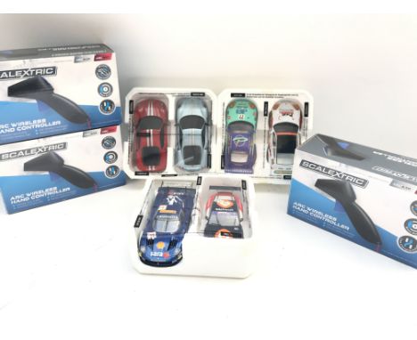 3 X Boxed Scalextric Wireless Controllers and 6 Cars.