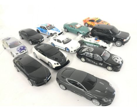 A Collection of 12 loose Scalextric Cars.
