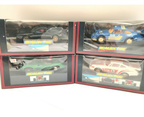 4 Boxed Scalextric Cars. Including a Martini Lancia.a Aston Martin.etc.