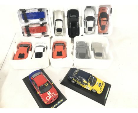 A Collection of Various Scalextric Cars. Including James Bond. A Audi A4. A Ford Mondeo. And Others.