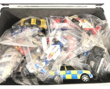 A Case containing Scalextric cars. Ideal for Spare Parts Etc.