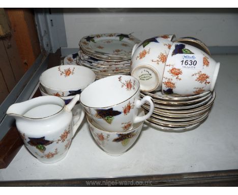 A Victorian Staffordshire Teaset including six cups, ten saucers, breakfast and tea plates, two slop bowls, milk jug and two 