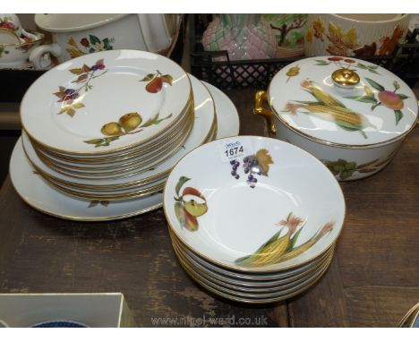A Royal Worcester 'Evesham' part Dinner Service including large oval plate, four dinner plates, six side plates, six soup bow