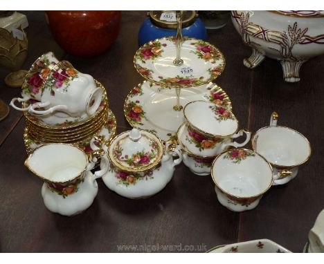 A quantity of Royal Albert 'Old Country Roses' including six cups and saucers, six side plates, jug, sugar bowls and cake sta