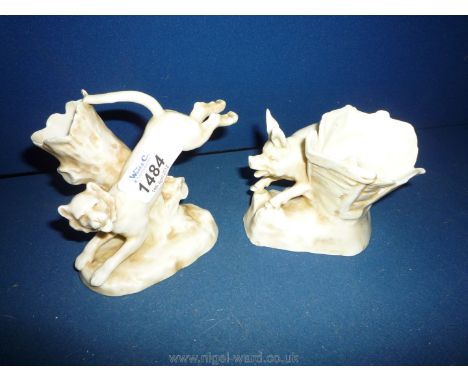 A pair of Continental china posy holders, one of a lion and tree trunk, the other a pig and basket