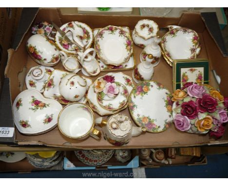 A large quantity of Royal Albert ''Old Country Roses'' items including candlestick, decorative shoes, bowls, trays, bells, et
