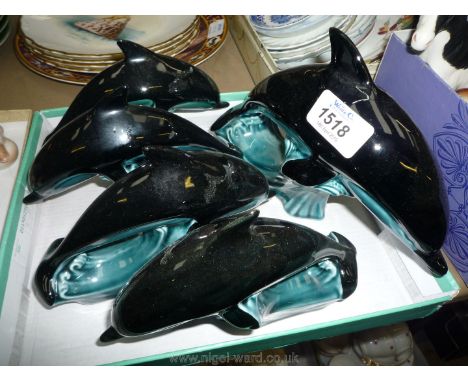 Five Poole Pottery Dolphins