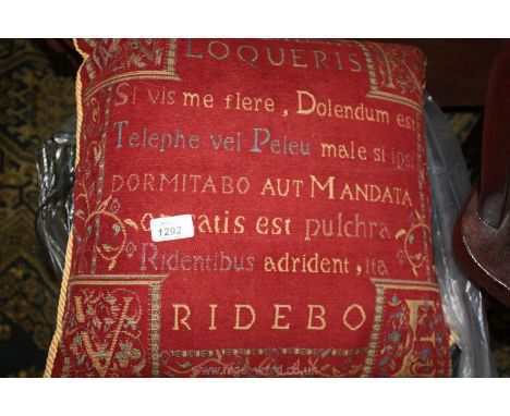 Seven red tapestry style cushions