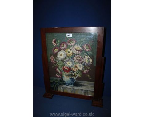 A wooden and embroidered Fire Screen 