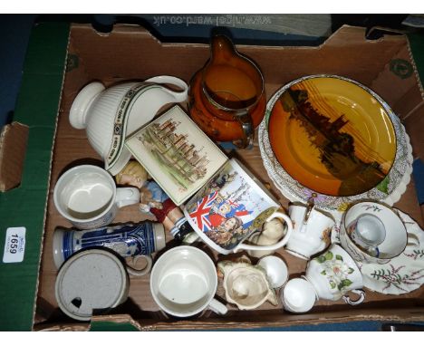 A quantity of china including Clarice Cliff plate, Doulton series ware plates, commemorative mugs, squirrel vase, etc