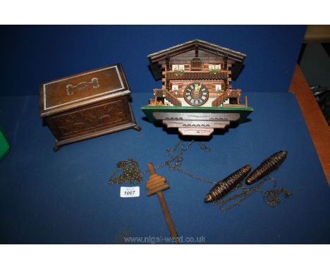 A wooden musical Box together with a wooden Cuckoo Clock
