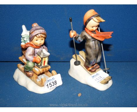 Two Hummel figures including Skier 59 and Ride into Christmas