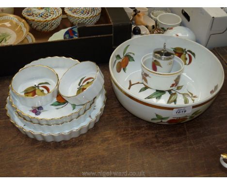 A small quantity of Royal Worcester Evesham including a large bowl, three flan dishes (one large, two smaller), egg coddler, 