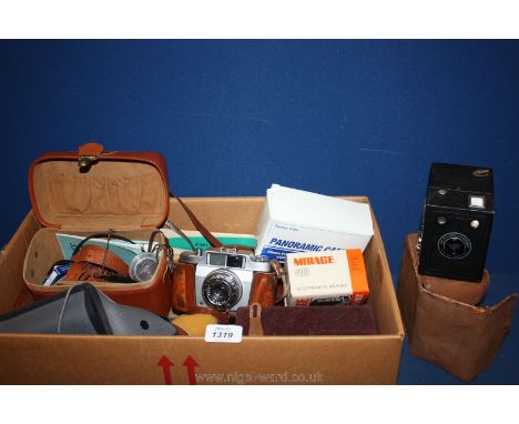 A box of old Cameras (one with tripod)