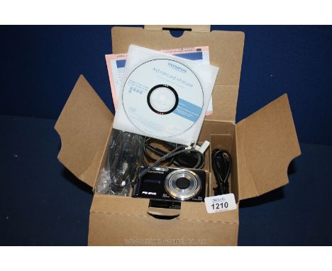 An Olympus FE 340 digital Camera in original box, complete with advanced manual and editing cd
