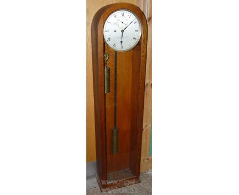 A late 19th Century Oak cased, Longcase Regulator Wall Clock by Kendal & Dent of London, having single pane arched top glazed