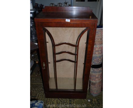 A deco Mahogany china Display Cabinet having upstand back, six pane glazed door, glazed sides, two glass shelves, on plinth b