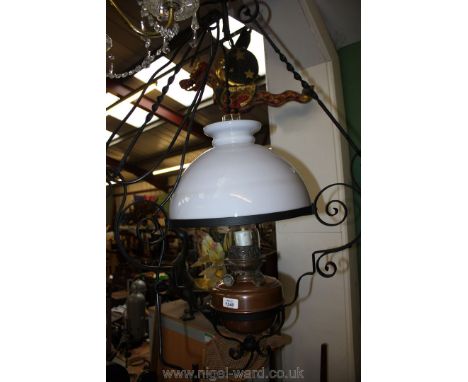 An antique Cathedral Lamp converted to electricity, complete with burner, glass flue and glass shade
