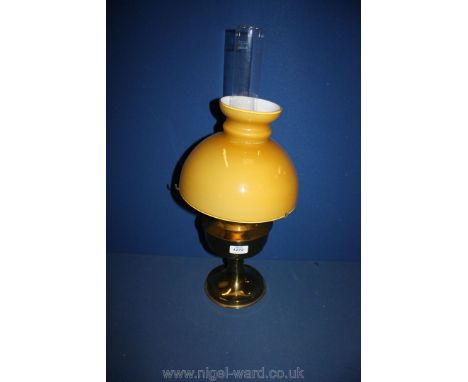 A brass finished Aladdin Oil Lamp with shade and chimney