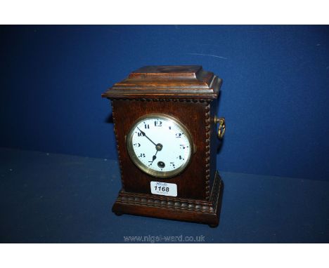 A small Oak cased bracket Clock