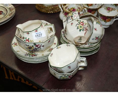 A Royal Doulton 'Old Leeds Sprays' part Teaset including six cups and saucers, plates, jug and bowl