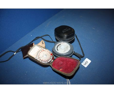A Weston Master V light metre in case together with a Gossen sixtucolor light meter in case 