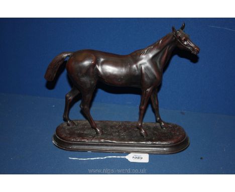 A Bronze figurine of a Horse signed C. Vatton