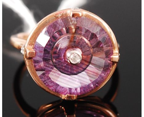 A modern 10ct rose gold, amethyst and diamond ring, the centre amethyst weighing 6.2ct, set with centre diamond weighing 0.04