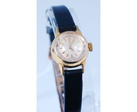A ladies Omega gold cased wristwatch, having manual wind movement, leather bracelet, 1.8cm   Condition Report / Extra Informa