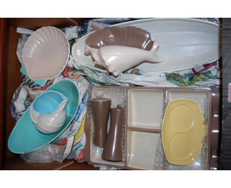 A box of assorted Poole pottery to include conch shells, cruets, hors d'oeuvres dish etc