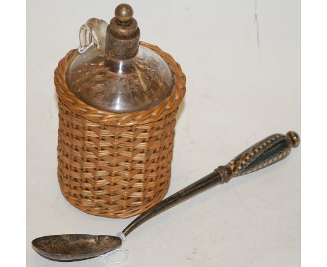 A Victorian engraved silver salad spoon, with Royal Doulton stoneware handle; together with an etched glass whisky decanter w